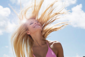 How To Keep Your Hair Frizz Free And Hydrated This Summer